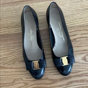 Salvatore Ferragamo Black Vara Flats with gold trim